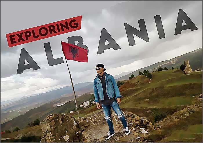 Personne avec drapeau explorant l'Albanie.